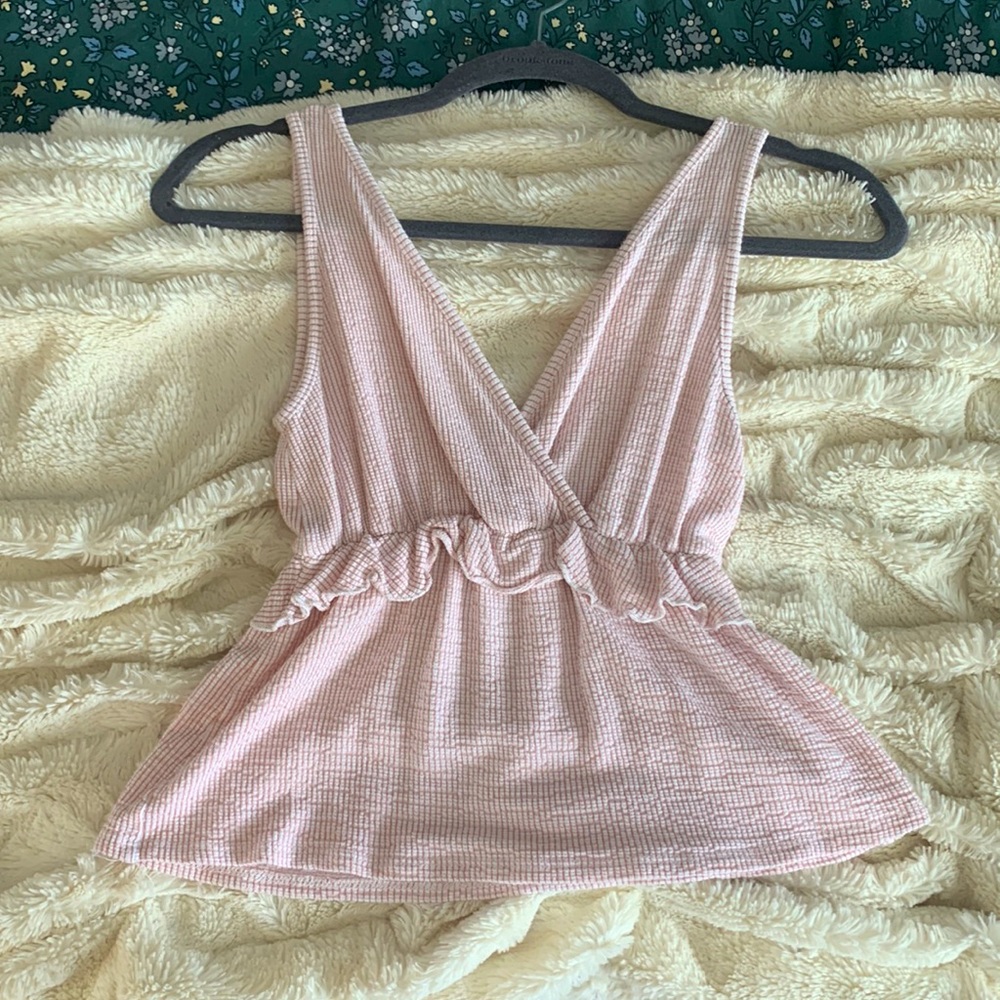 Pink strappy tank with ruffles